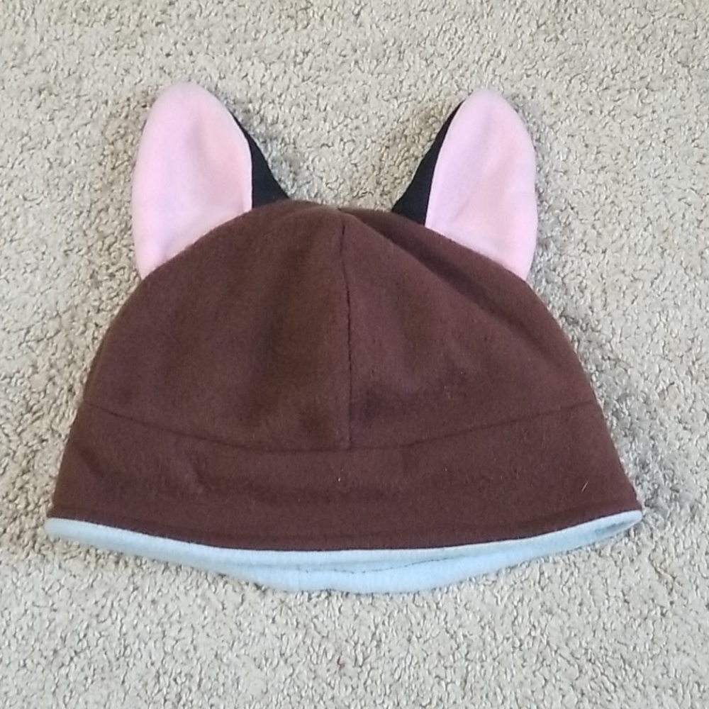 Dog eared skull cap